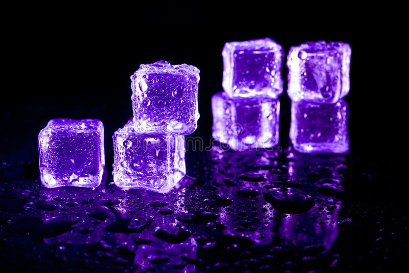 Purple ice cubes. stock photo. Image of celebration