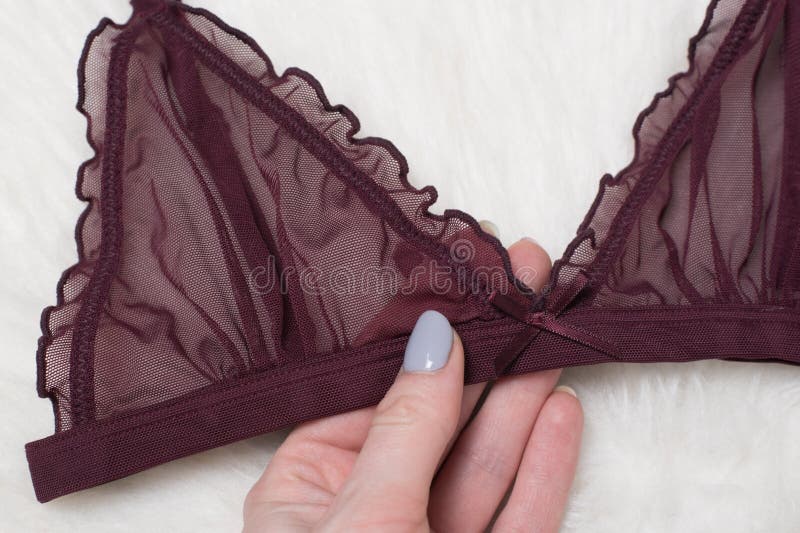 Premium Photo  Underwear and beautiful manicured female hands unbutton bra