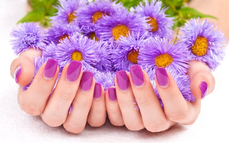 Purple manicure and flowers