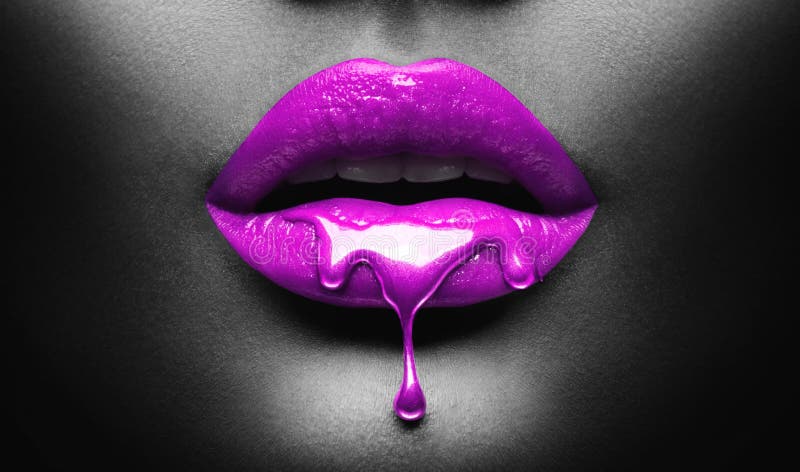 Purple Paint dripping, lipgloss drops on sexy lips, bright liquid paint on beautiful model girl`s mouth, black skin. Lipstick