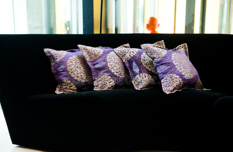 Purple pillows on a sofa stock photo. Image of home, contemporary