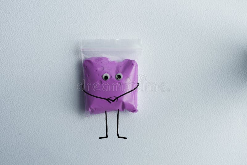 Purple Plasticine with Eyes, Hands and Feet Stock Photo Image of