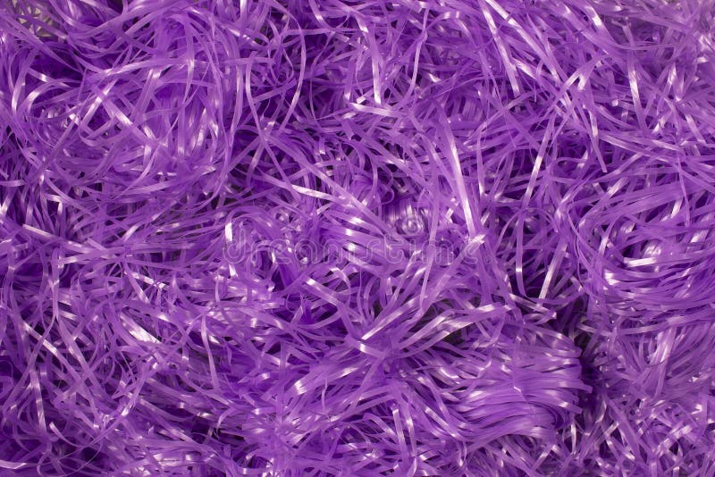 Purple Shredded Plastic Fake Easter Grass Background Stock Image
