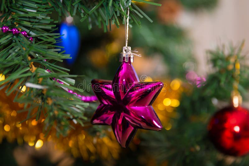 Purple Star Christmas Ball on Tree Stock Photo Image of holiday