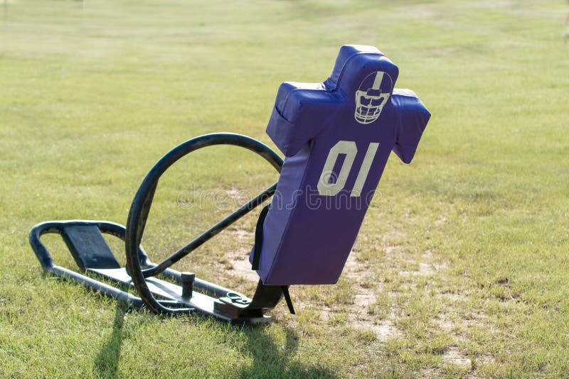 Purple tackling dummy sled stock image. Image of football 83371283