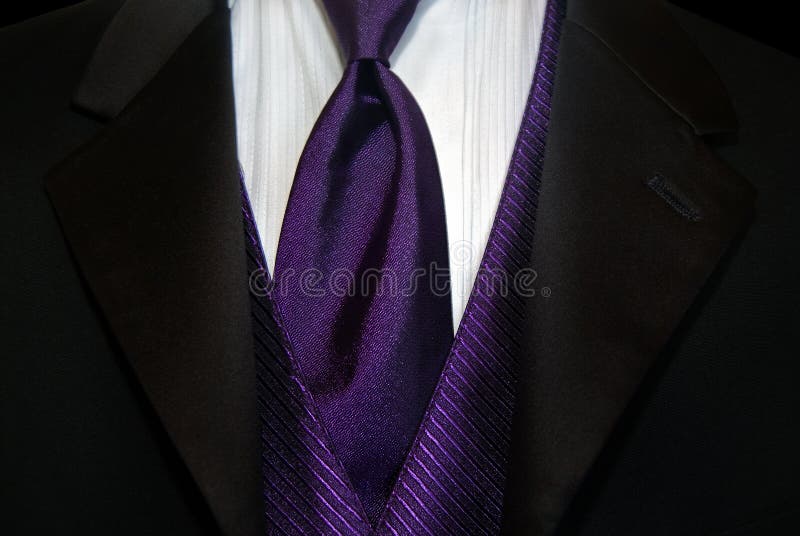 beige suit purple tie