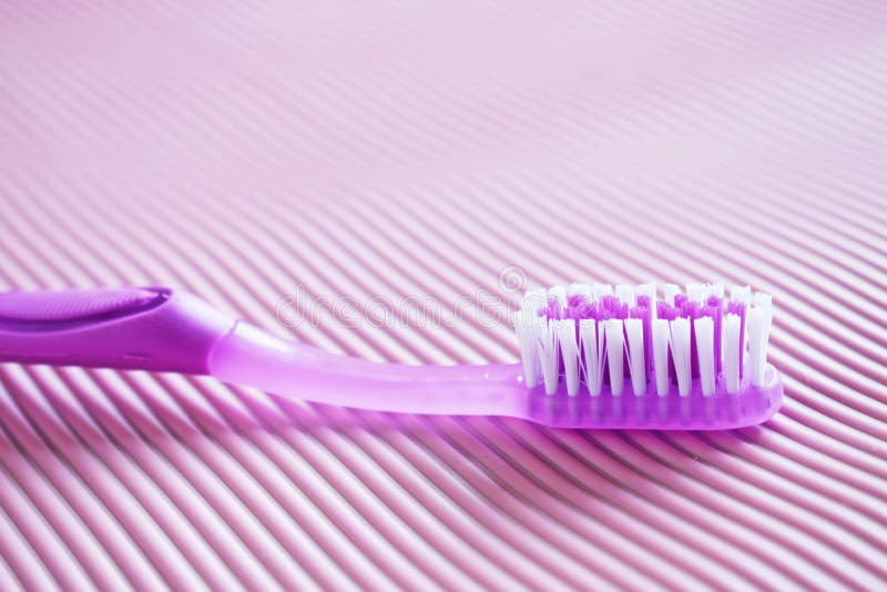 Purple toothbrush. royalty free stock photo