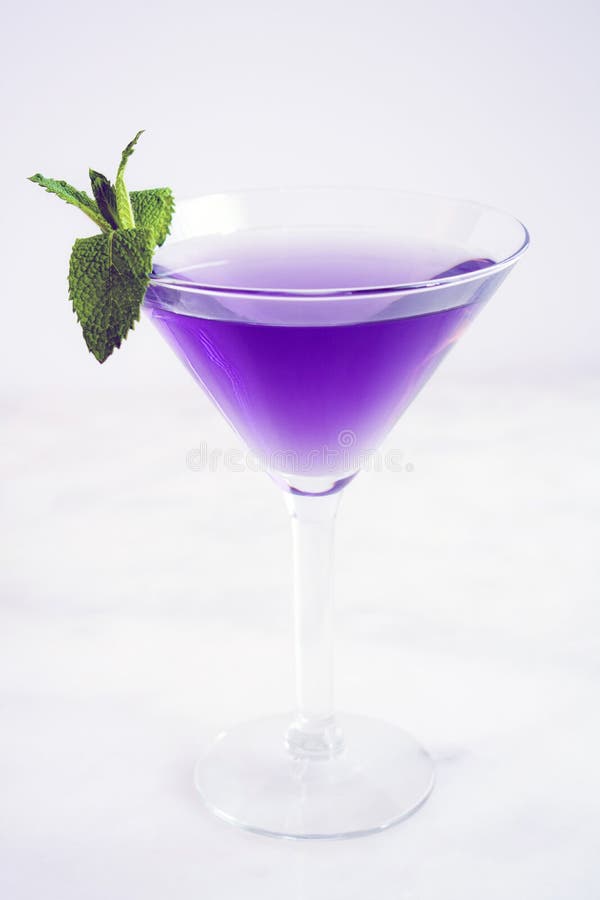 Purple Martini Cocktail with Mint Garnish