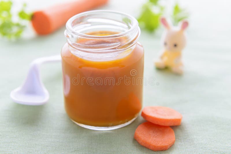 Puré da cenoura para o bebê fotografia de stock royalty free Puré da cenoura para o bebê fotografia de stock royalty free