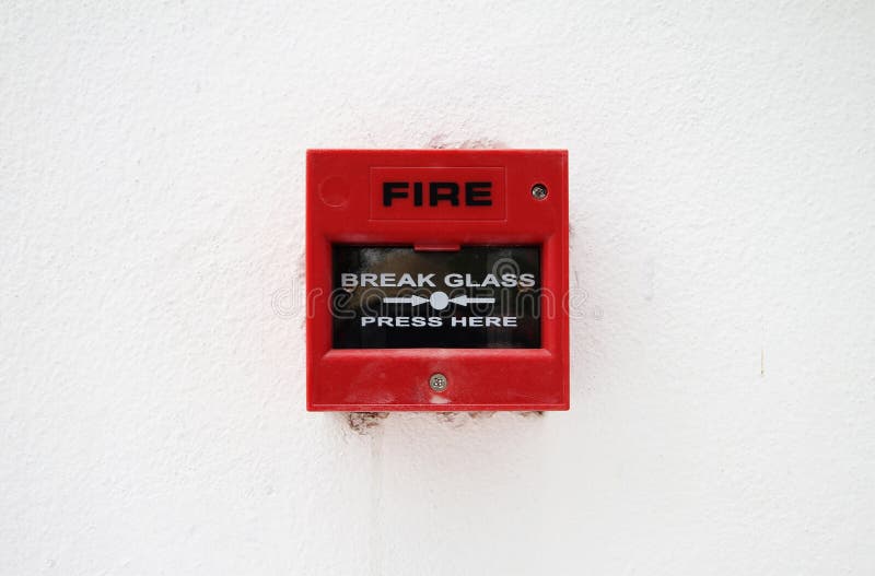 Push button switch fire on wall royalty free stock photo