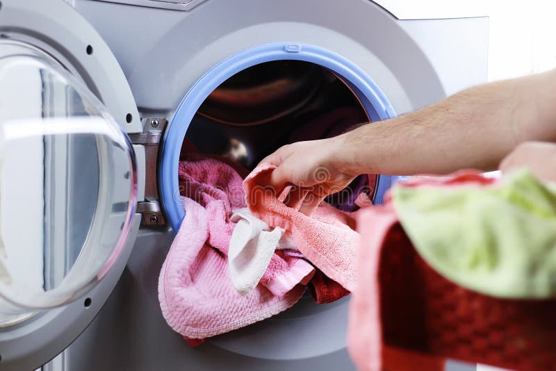 Put cloth in washer stock image. Image of concept, clean 79276181