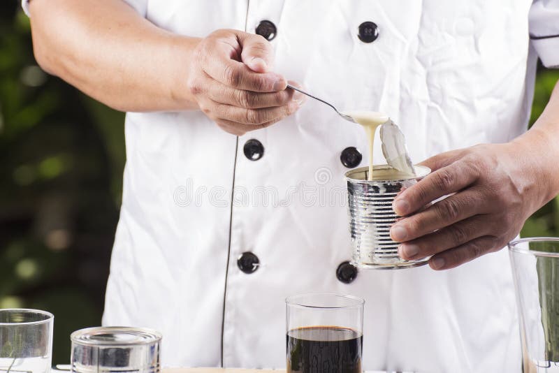 Putting Condensed Milk in To Hot Coffee Stock Image Image of cafe, restaurant 68179385