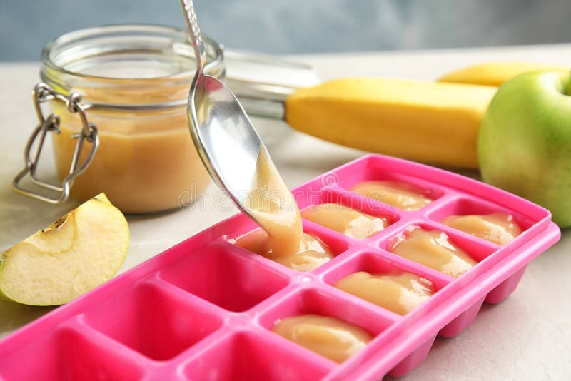 Putting Healthy Baby Food Into Ice Cube Tray, Stock Image ...