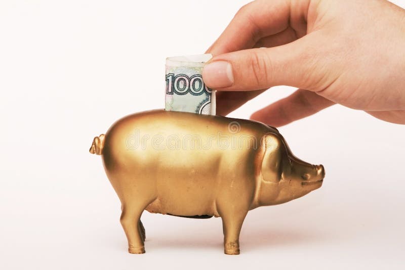 Putting money into Piggy Bank