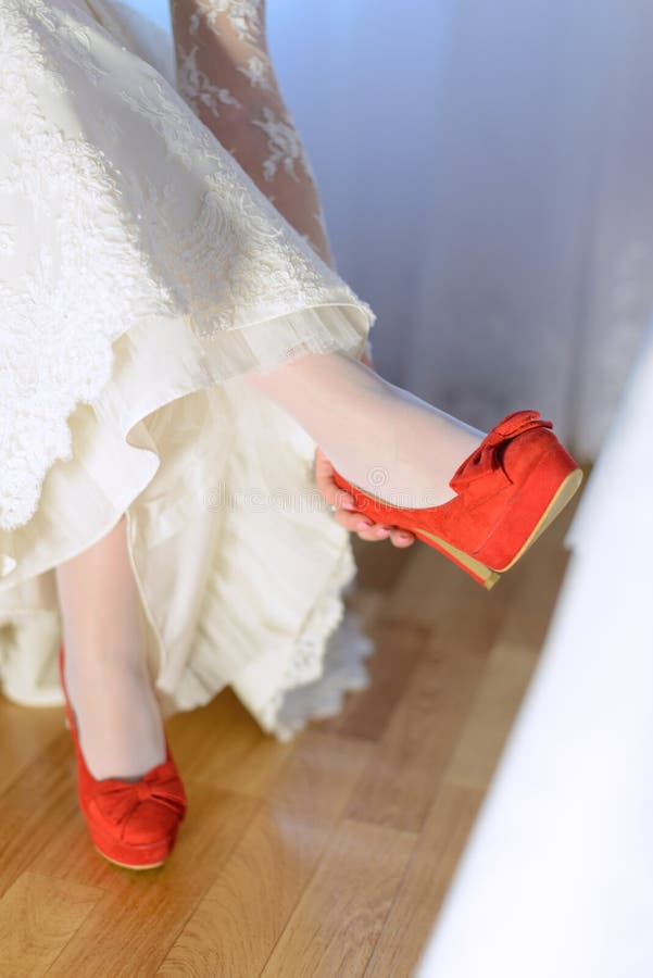 Brides red sole high heels stock photo. Image of celebration - 30399034