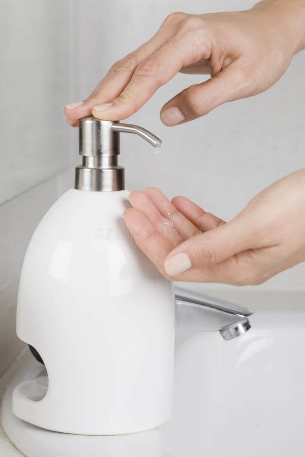 Putting some soap on hands royalty free stock photo