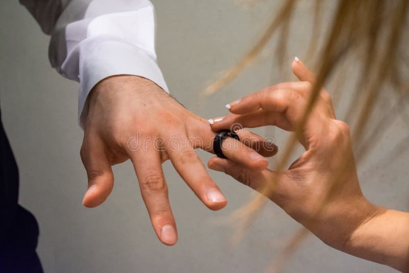 Putting the Wedding Ring on His Finger Stock Image Image of marital, lovers 144817631