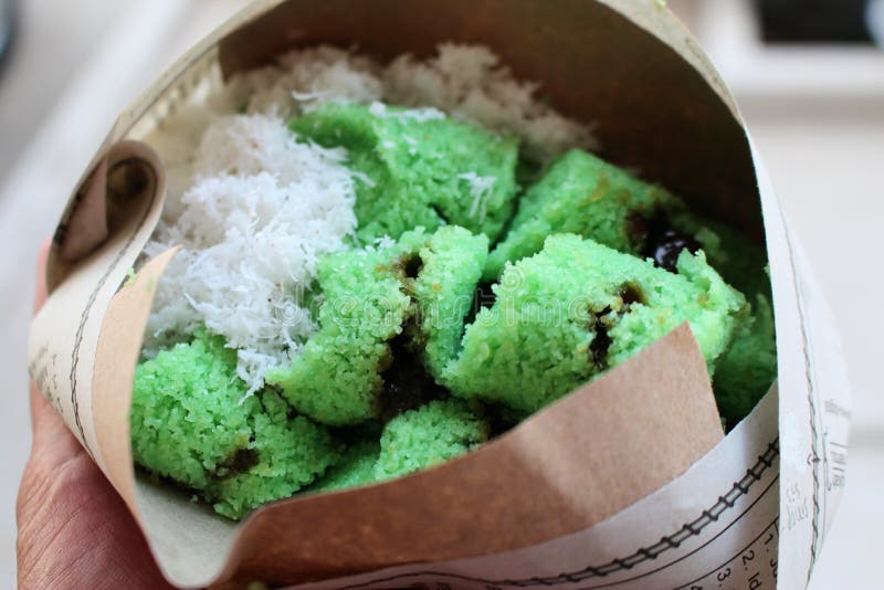 Putu Cake & X28;kue Putu& X29; with Melting Palm Sugar on a Paper