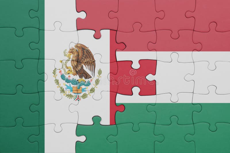 Puzzle with the colourful national flag of hungary and mexico concept fotografie stock libere da diritti
