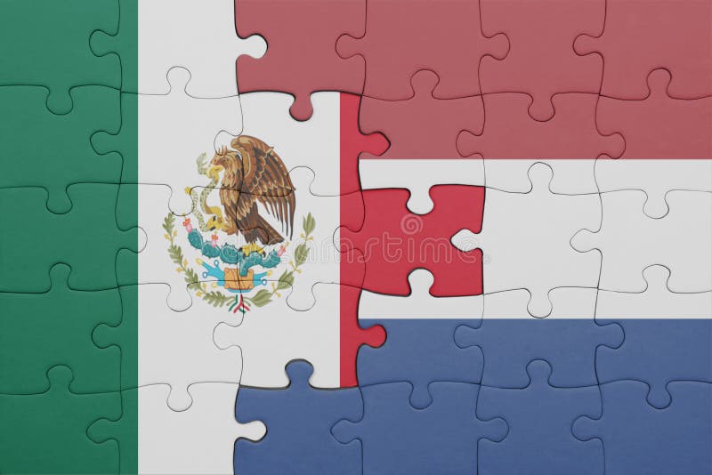 Puzzle with the colourful national flag of netherlands and mexico concept fotografia stock libera da diritti