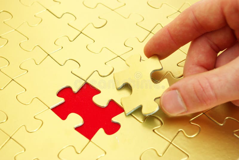Puzzle in hand stock photo