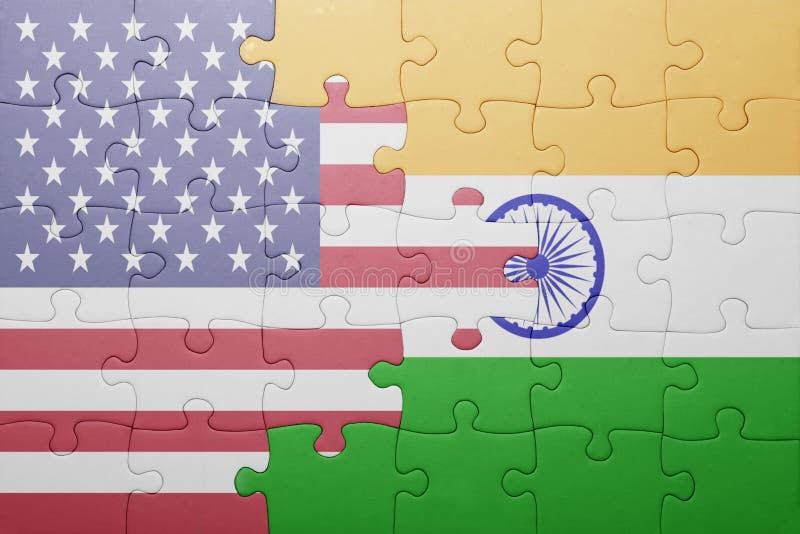 Puzzle with the national flag of united states of america and india.concept