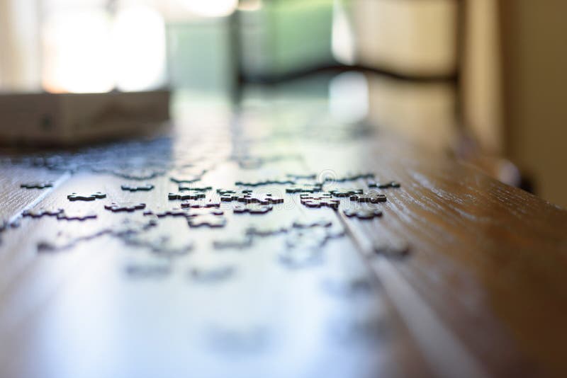 Shallow depth of field focus on a few puzzle pieces