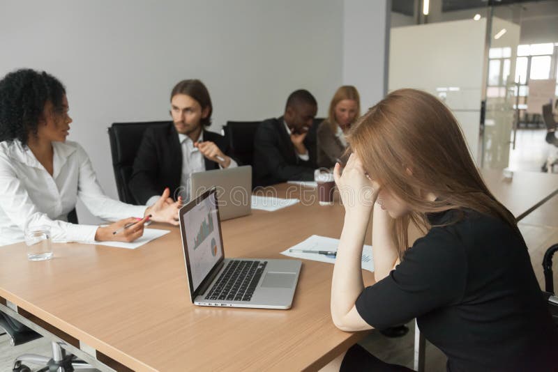 Puzzled serious businesswoman concerned about project statistics