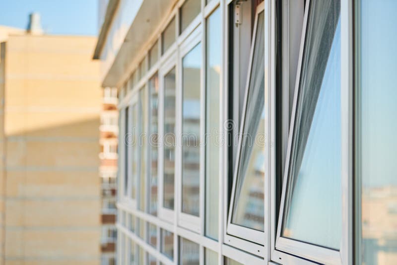 PVC windows on facade of skyscraper royalty free stock photos