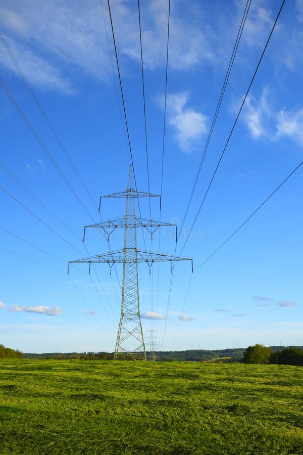 Pylon of the Electricity Power Line on Blue Sky Background.Electricity