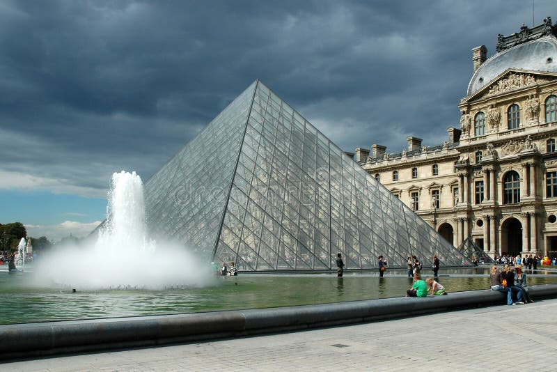 PARIS, FRANCE CIRCA AUGUST 2006 - The Pyramid of the Louvre before the storm