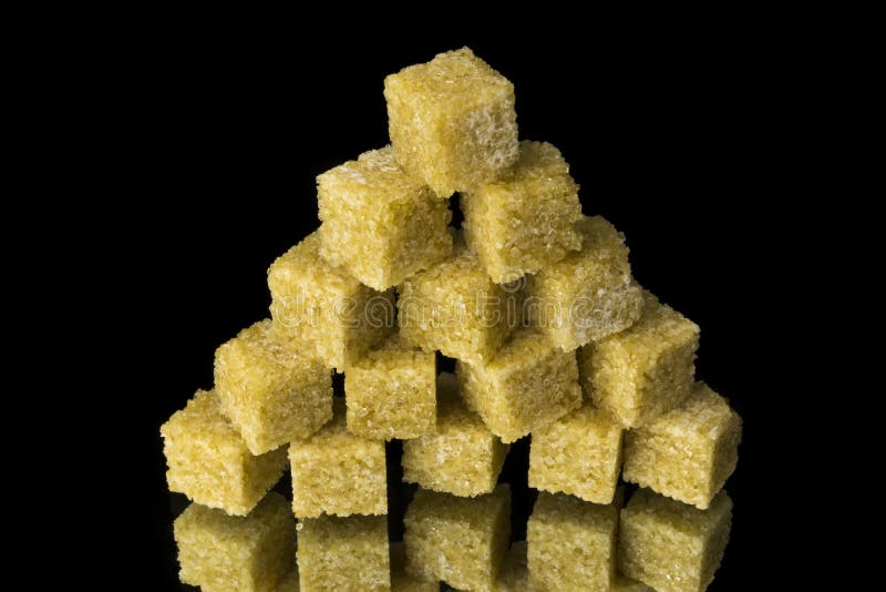 Pyramid from sugar cubes stock image. Image of dessert 52164461