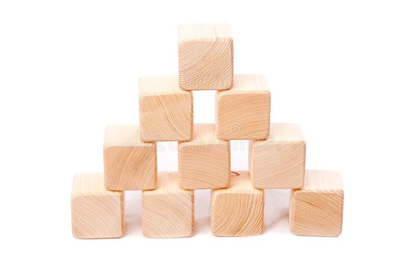Pyramid from wooden cubes royalty free stock photo