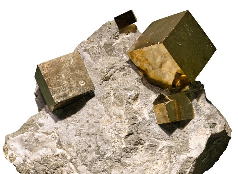 Close-up view of the pyrite cubic crystals embedded in a matrix on white background. Close-up view of the pyrite cubic crystals embedded in a matrix on white background