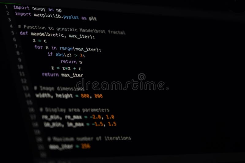 Python 代码深色主题 IDE 在显示器上 免版税库存图片