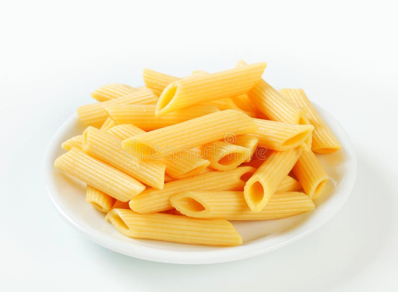 Pâtes cuites de penne photo stock.
