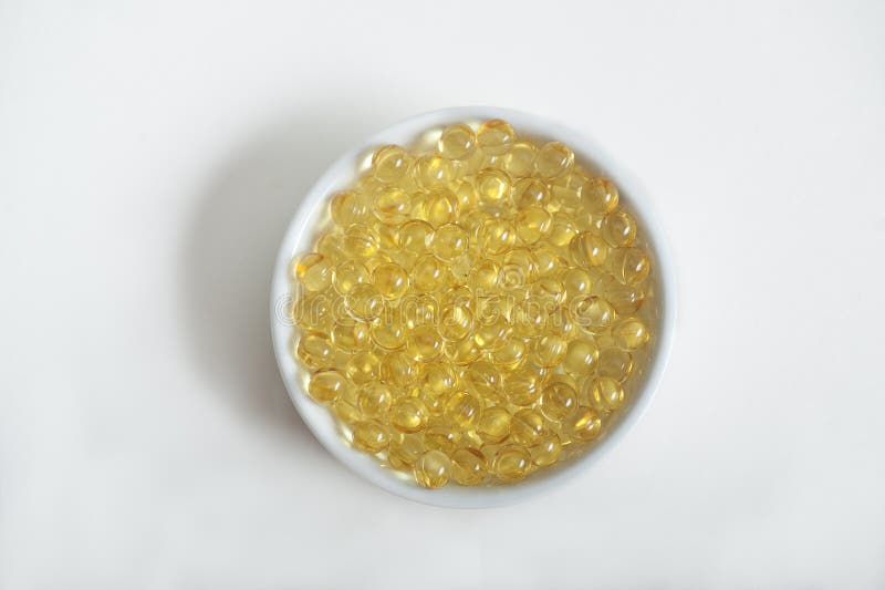 Píldoras de la vitamina (A, D, E, aceite de pescado) fotografía de archivo libre de regalías Píldoras de la vitamina (A, D, E, aceite de pescado) fotografía de archivo libre de regalías