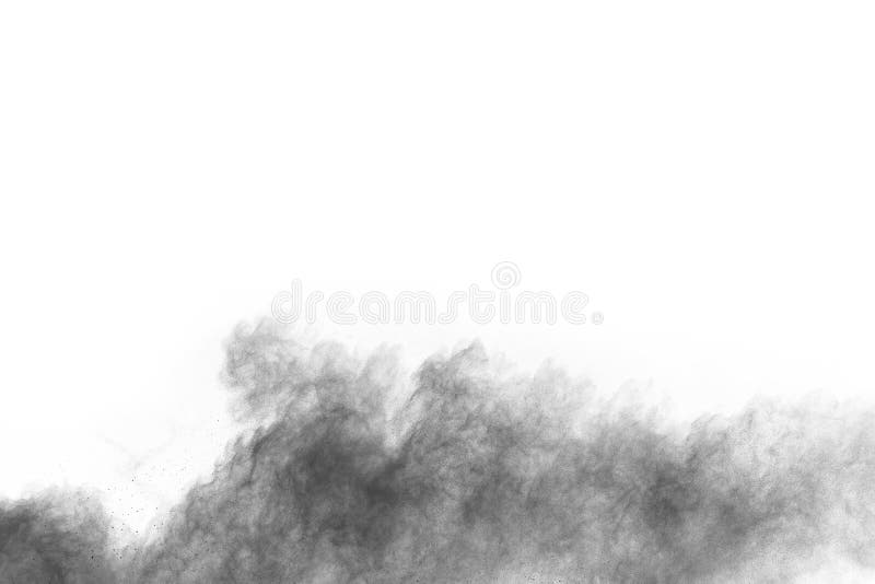 Particles of charcoal on white background,abstract powder splatted on white background,Freeze motion of black powder exploding or throwing black powder. Particles of charcoal on white background,abstract powder splatted on white background,Freeze motion of black powder exploding or throwing black powder.