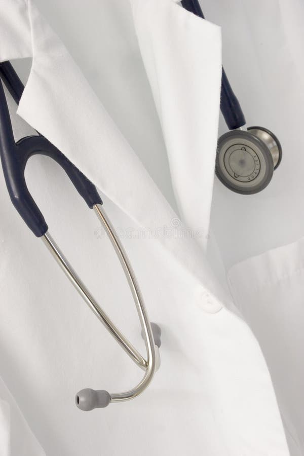 A stethoscope drapes over a doctor's labcoat. A stethoscope drapes over a doctor's labcoat