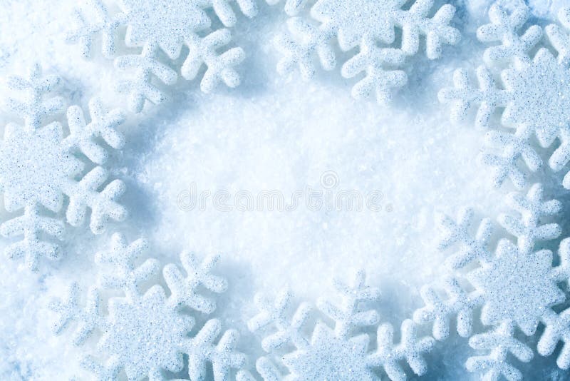 Płatki śniegu Obramiają, Śnieżnych płatków dekoraci Błękitny tło, zima