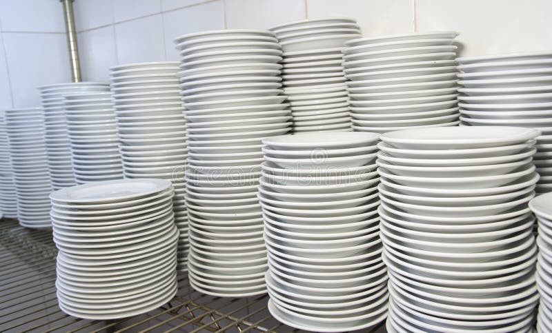 Stack of dishware or dinner plates. Stack of dishware or dinner plates