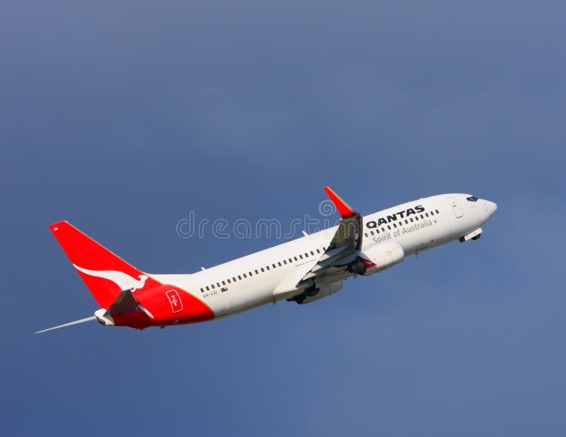 Qantas Boeing 737 in flight royalty free stock photography