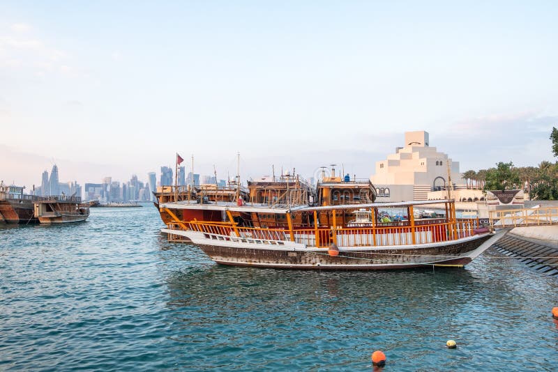 Qatari traditional dhow boats moored near Museum of Islamic Art Doha royalty free stock images