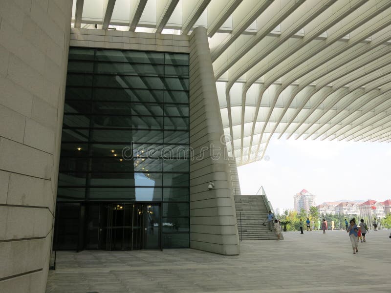 Qingdao Grand Theatre is a landmark of Qingdao public cultural facilities, the total area of 87000 square meters, the appearance is similar to two white piano. By the German von Gkan, marg and partners architects.Qingdao mountain, sea, cloud formed Bolshoi design theme. Water is the Source of Life, the sea is the soul of the city, streams, ebb and flow, which is to make the main theatre. Qingdao Grand Theatre is a landmark of Qingdao public cultural facilities, the total area of 87000 square meters, the appearance is similar to two white piano. By the German von Gkan, marg and partners architects.Qingdao mountain, sea, cloud formed Bolshoi design theme. Water is the Source of Life, the sea is the soul of the city, streams, ebb and flow, which is to make the main theatre.