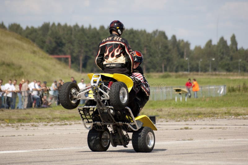 Quad wheelie stock image. Image of cross, four, play, people 640441