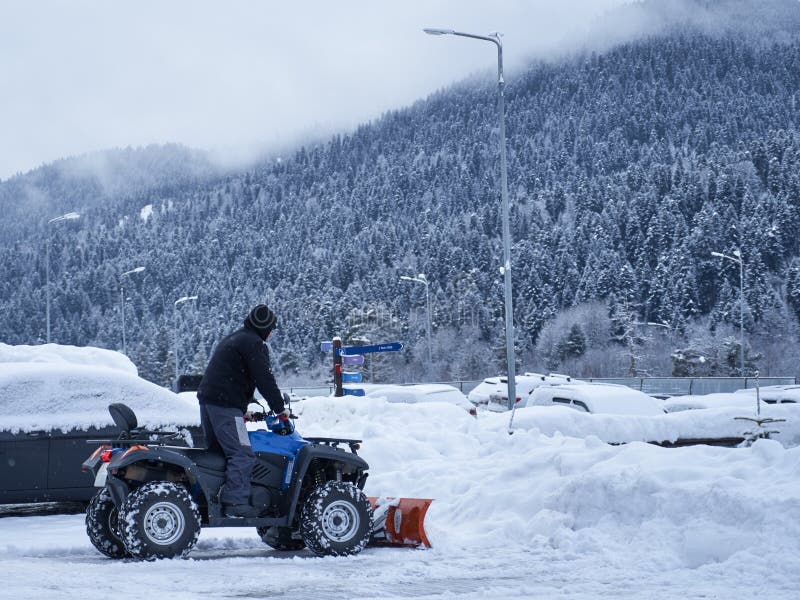 Quad with the Installed Equipment for Snow Removal Stock Photo Image