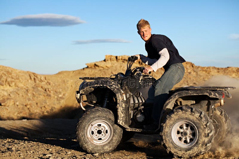 Quad Teen Driving Four Wheeler Stock Image Image of driving, quad