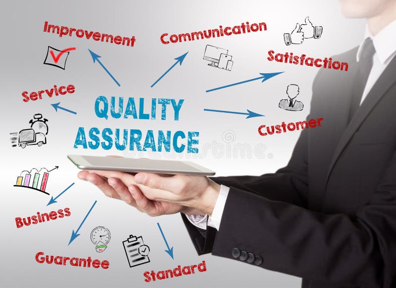 Quality Assurance concept, young man holding a tablet computer stock photo Quality Assurance concept, young man holding a tablet computer stock photo
