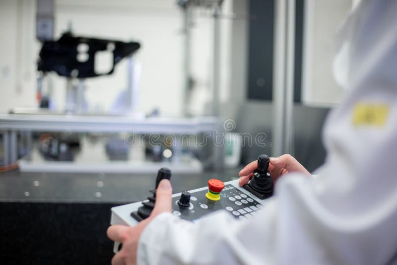 Quality engineer measuring some moldings, components by professional 3D measuring system machine, industrial concept. Quality engineer measuring some moldings royalty free stock photos Quality engineer measuring some moldings, components by professional 3D measuring system machine, industrial concept. Quality engineer measuring some moldings royalty free stock photos