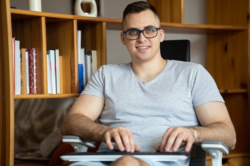The quarantined guy works remotely from home. Communication, people and freelance work concept stock images